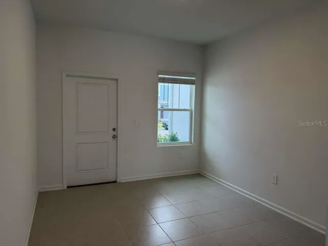 a view of a room with a flat screen tv