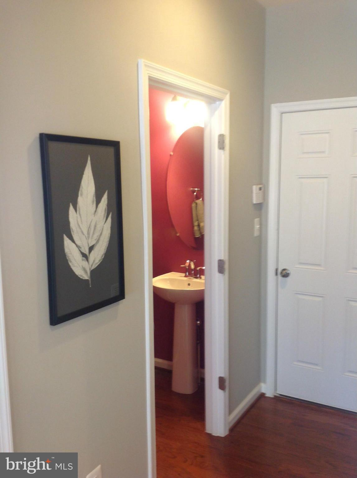 1002 Horse Collar Road Accokeek, MD 20607 - Photo 11 of 28 Model pic of Briarwood Garage Entrance/Powder Room