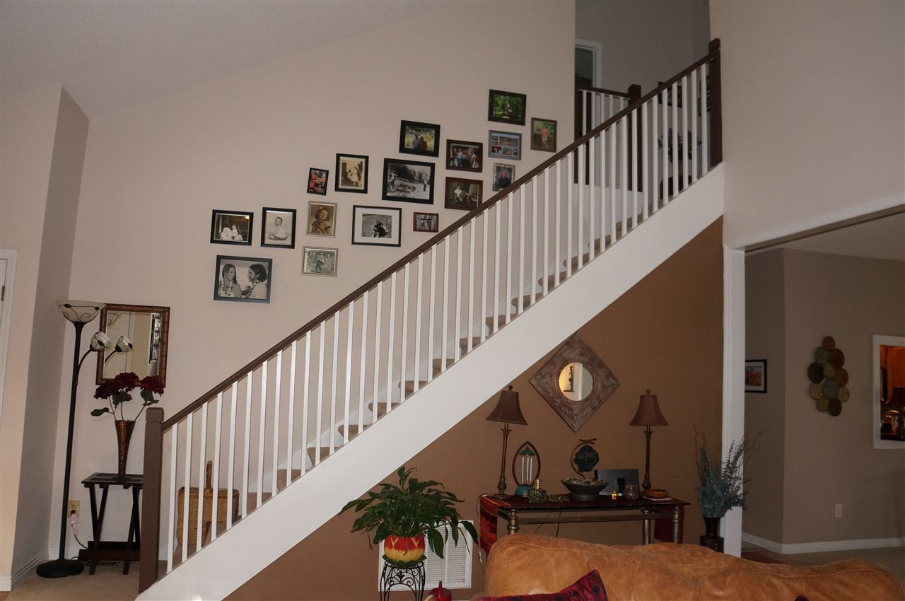 4121 Landfall Court Raleigh, NC 27613 - Photo 17 of 25 Staircase to 2nd Floor