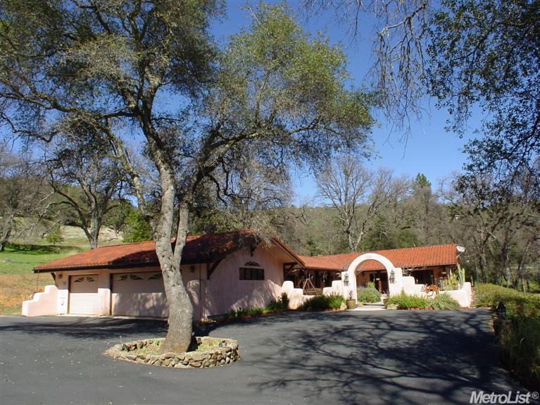 18308 Brewer Road Alta Sierra, CA 95949 - Photo 1 of 1 a view of a town with large trees