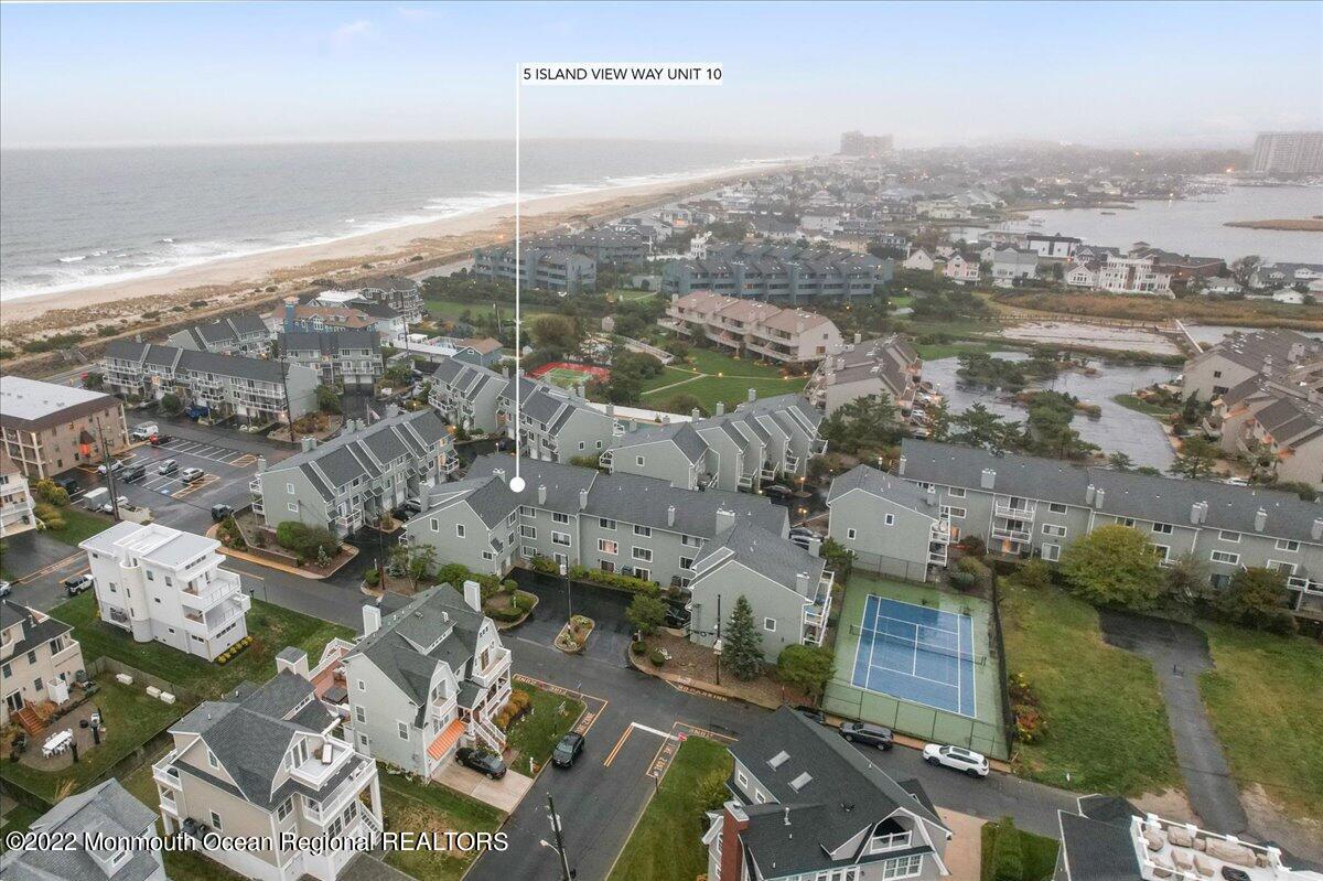 5 Island View Way, Unit 10 Sea Bright, NJ 07760 - Photo 2 of 30 an aerial view of a city with ocean view