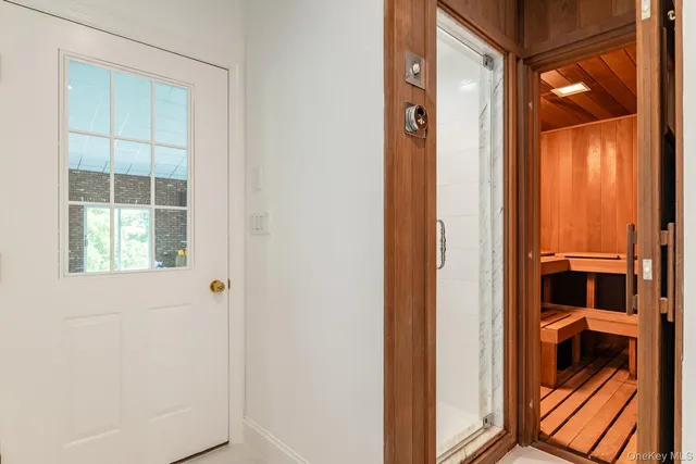 a kitchen with stainless steel appliances granite countertop a sink and a refrigerator