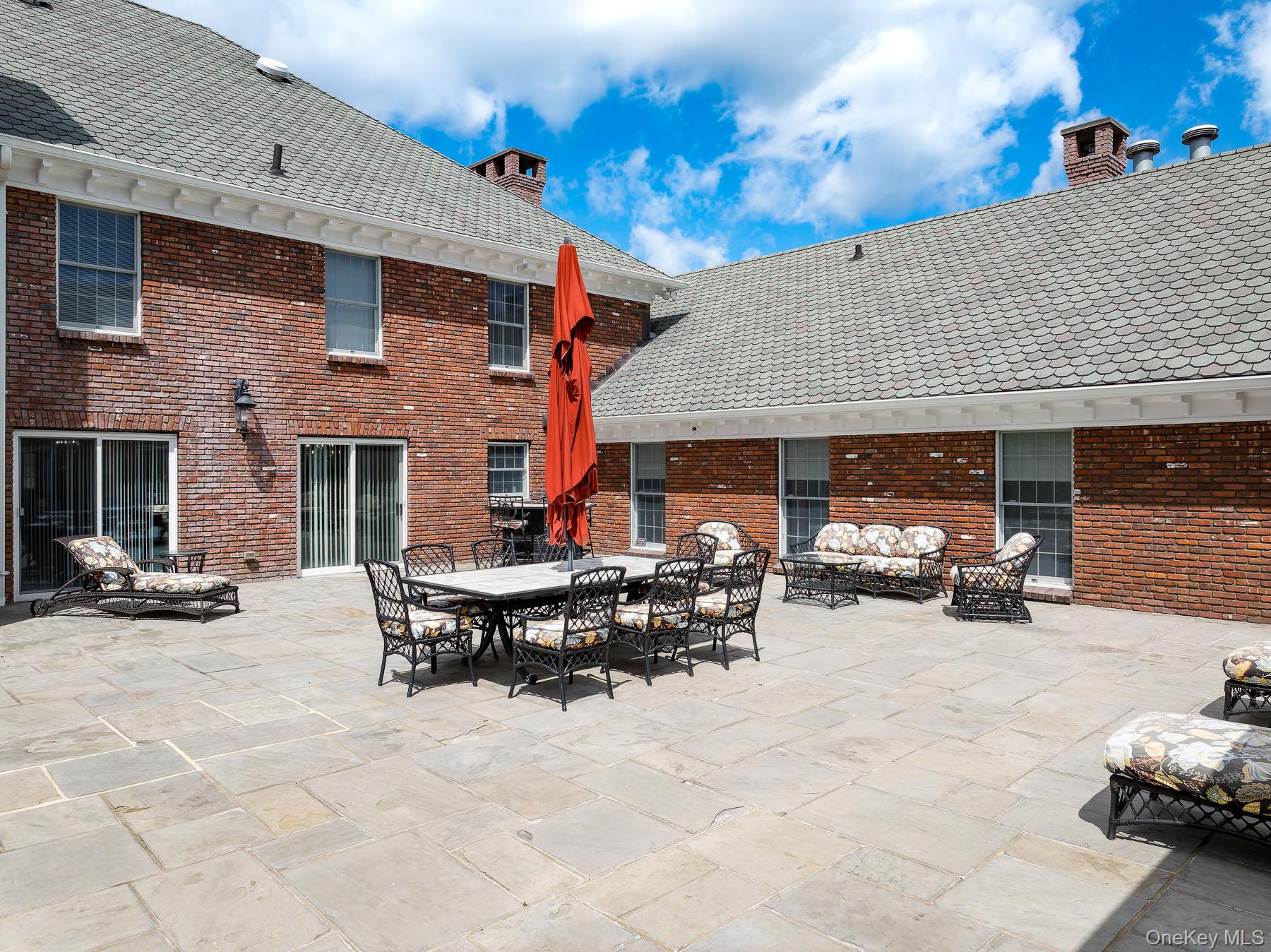 109 Mamaroneck Road Scarsdale, NY 10583 - Photo 26 of 50 View of courtyard patio for indoor/outdoor entertaining and living
