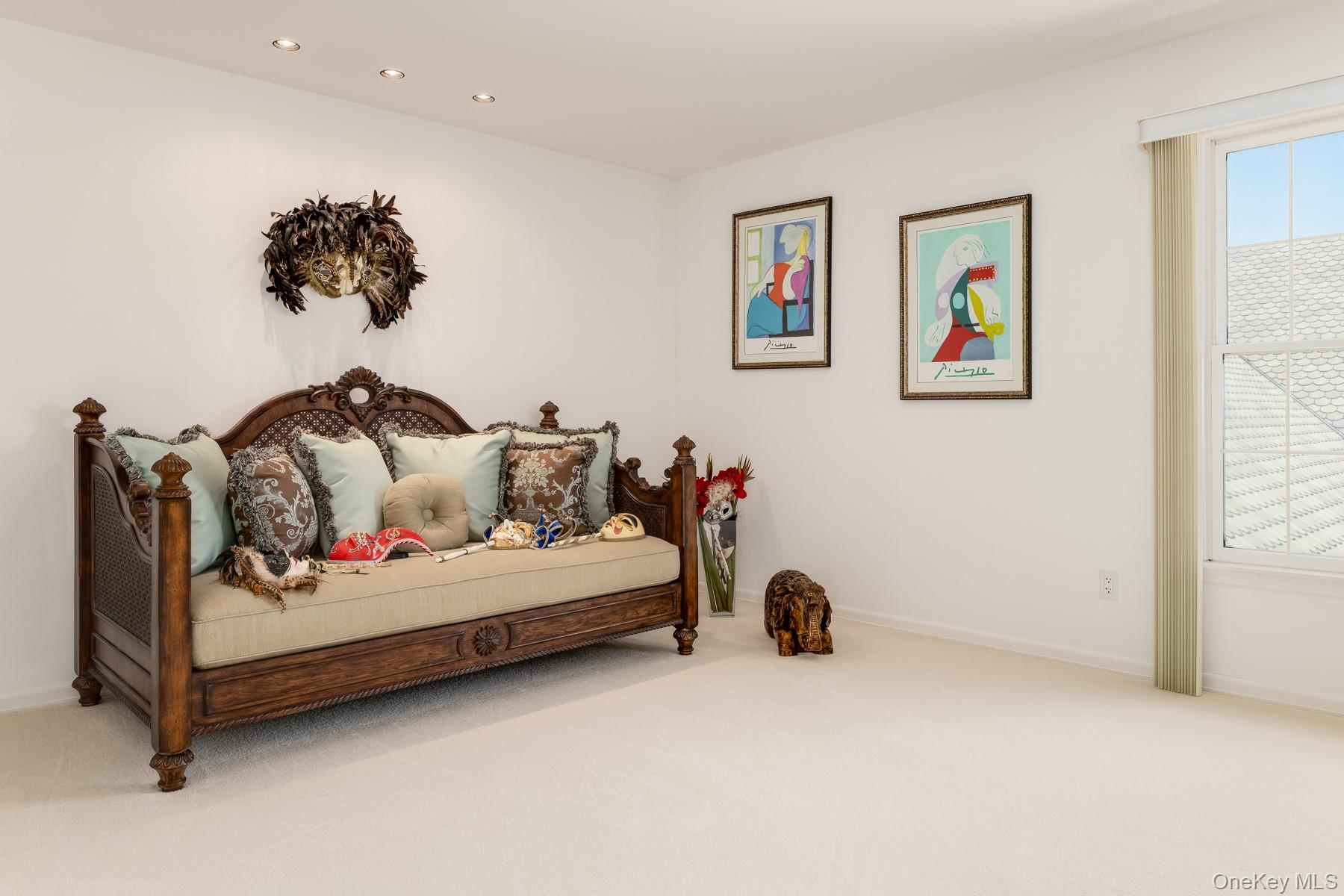 109 Mamaroneck Road Scarsdale, NY 10583 - Photo 44 of 50 Bedroom with large windows and closets featuring hardwood floors under carpet recessed lighting on dimmers