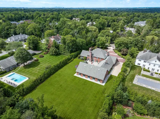 an aerial view of a house with a garden