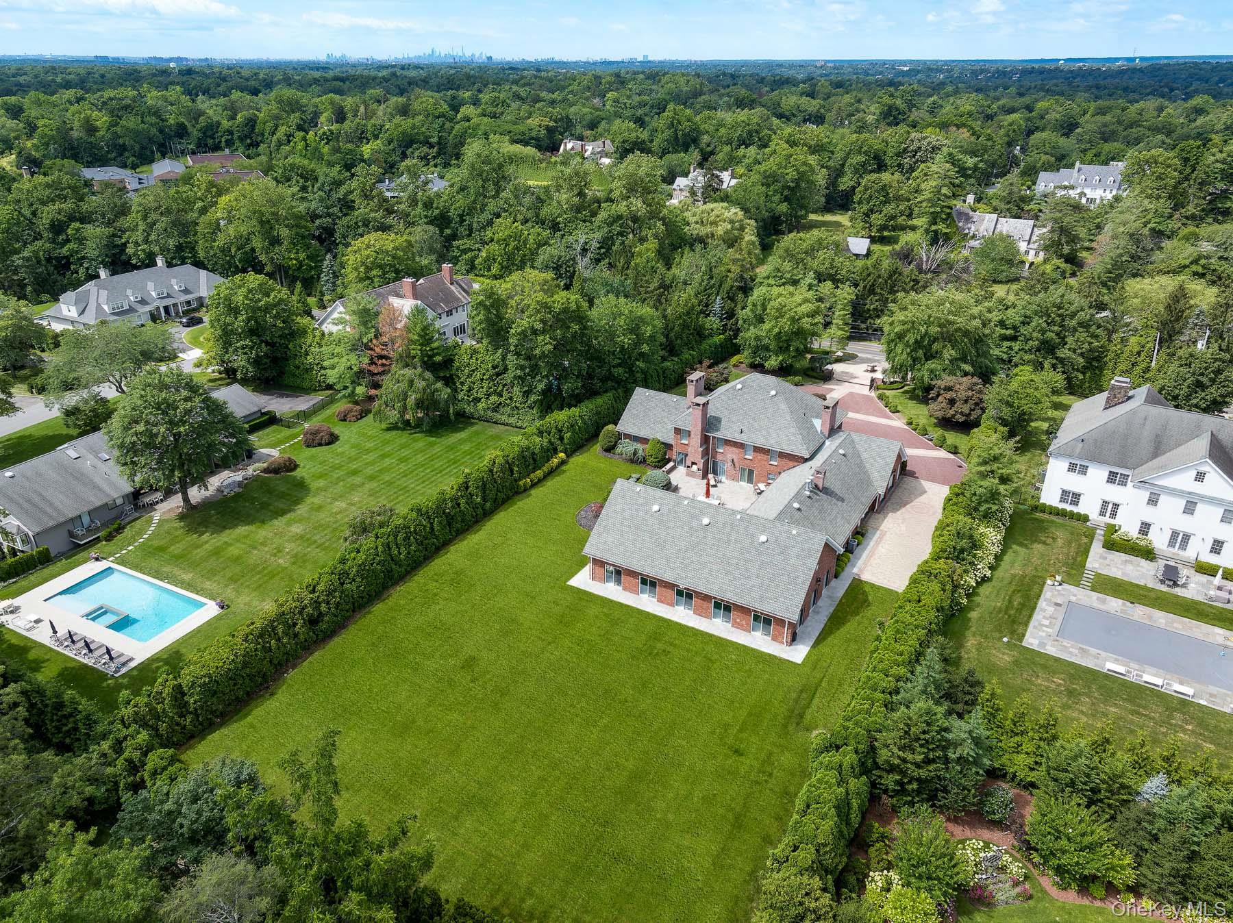109 Mamaroneck Road Scarsdale, NY 10583 - Photo 5 of 50 Great view of large backyard surrounded by tall hemlock trees