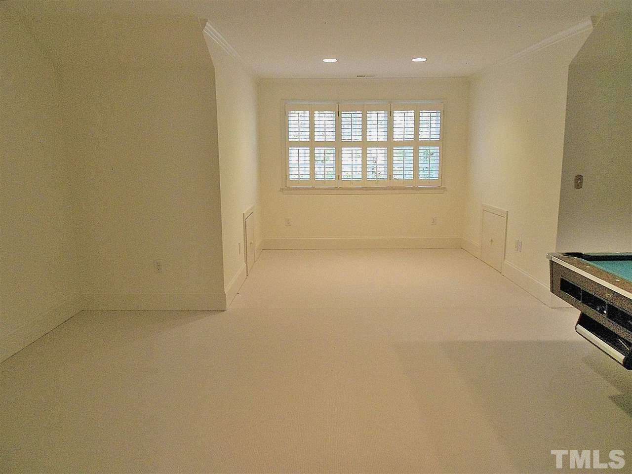 2300 Elmsford Way Raleigh, NC 27608 - Photo 26 of 30 ...looking towards the left side. There's also a large walk-in attic space beyond the pool table (not shown)