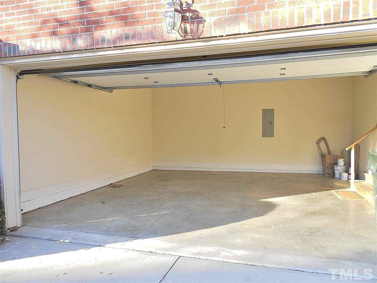 2300 Elmsford Way Raleigh, NC 27608 - Photo 29 of 30 ...included with a townhome is a rare find Inside the Beltline. Also, the garage door closing mechanism is new.