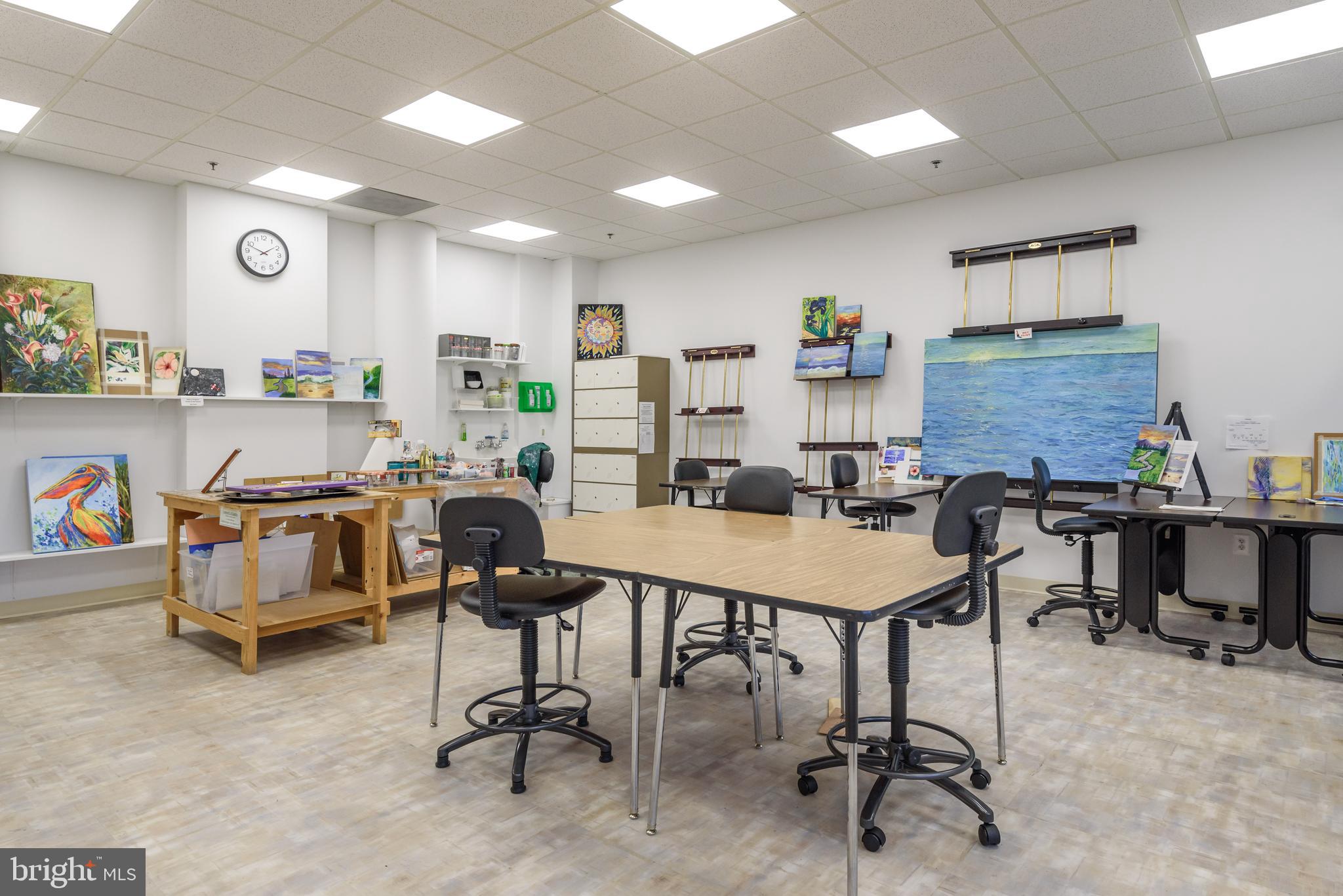 19365 Cypress Ridge Terrace, Unit 1115 Leesburg, VA 20176 - Photo 30 of 34 a view of a workspace with furniture