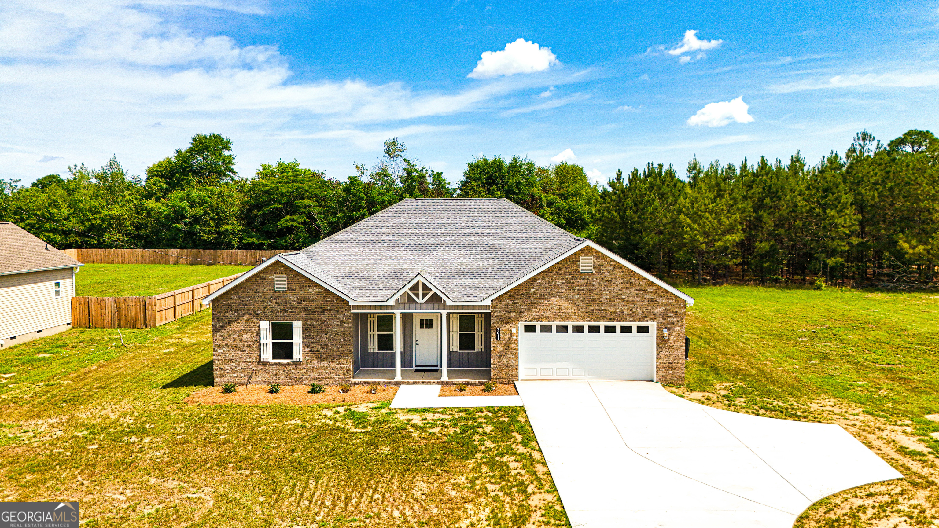 2011 Griffin Road Macon, GA 31216 - Photo 1 of 64 a view of a house with a yard