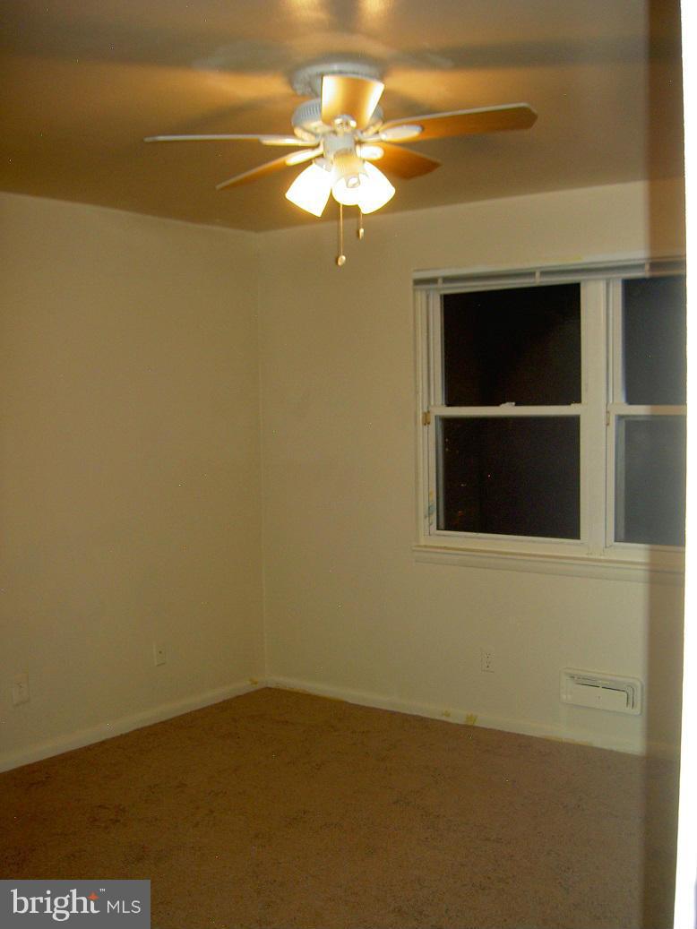 4510 Maryknoll Road Baltimore, MD 21208 - Photo 18 of 30 a view of a livingroom with a window