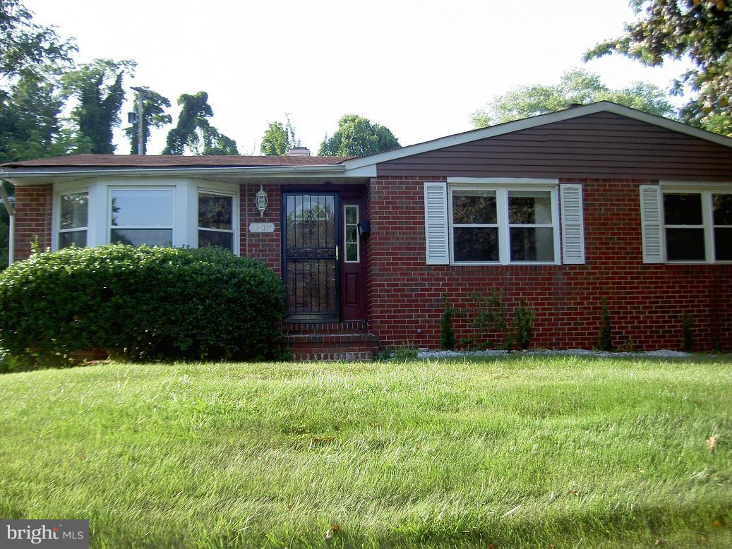 4510 Maryknoll Road Baltimore, MD 21208 - Photo 3 of 30 a view of front of a house with a yard