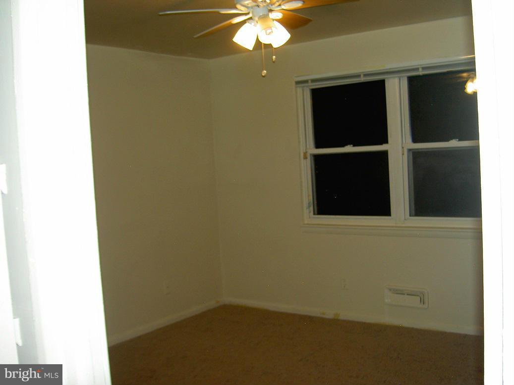 4510 Maryknoll Road Baltimore, MD 21208 - Photo 26 of 30 a view of a livingroom with a window