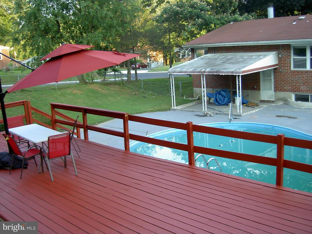 4510 Maryknoll Road Baltimore, MD 21208 - Photo 28 of 30 a view of a house with a yard and sitting area