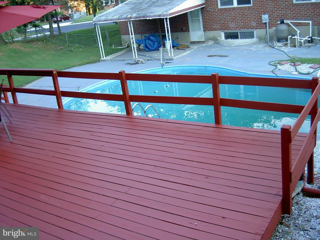 4510 Maryknoll Road Baltimore, MD 21208 - Photo 29 of 30 a view of a deck with a yard