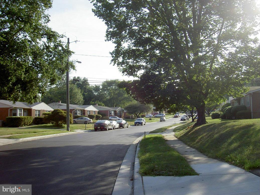 4510 Maryknoll Road Baltimore, MD 21208 - Photo 5 of 30 a view of city street with cars parked