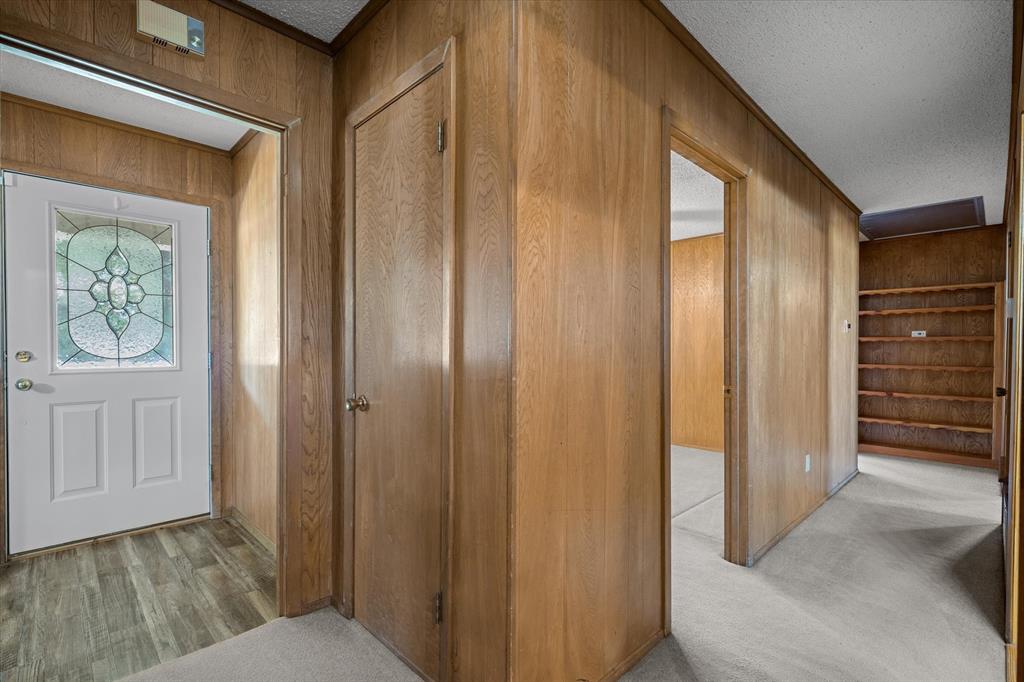 3121 County Road 1215 Canton, TX 75103 - Photo 18 of 40 a view of a hallway with closet and bathroom
