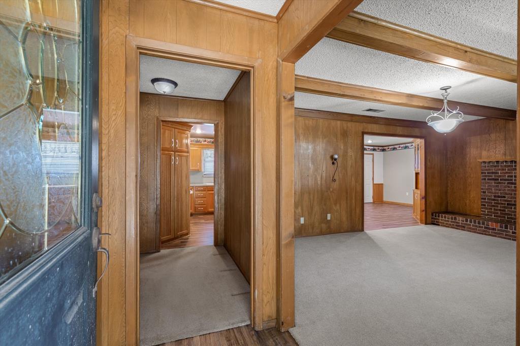3121 County Road 1215 Canton, TX 75103 - Photo 4 of 40 a view of a hallway with wooden shelves