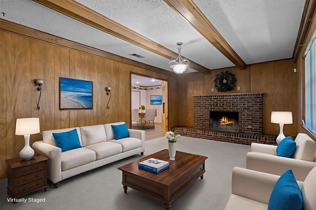 3121 County Road 1215 Canton, TX 75103 - Photo 6 of 40 a living room with furniture and a fireplace