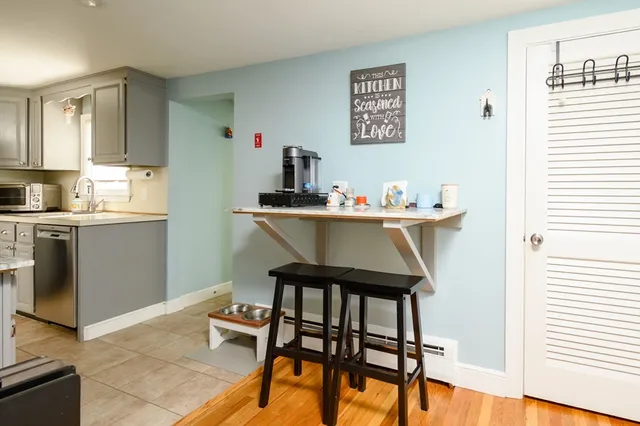 a room with a table and chairs