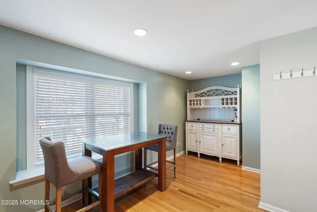 a workspace with furniture and window