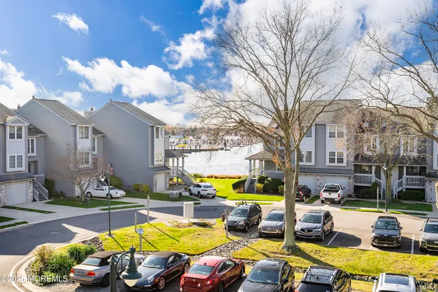 a view of a swimming pool and lounge chairs