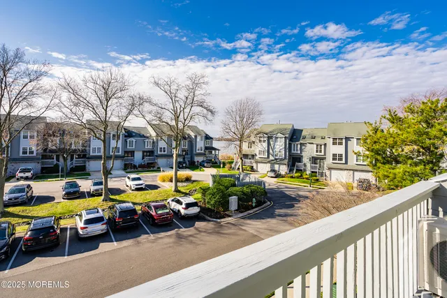 a view of swimming pool with outdoor seating