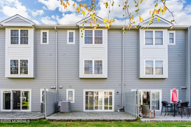 a front view of a building with garden