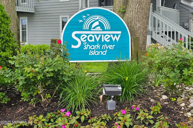 a sign that is on a wooden wall