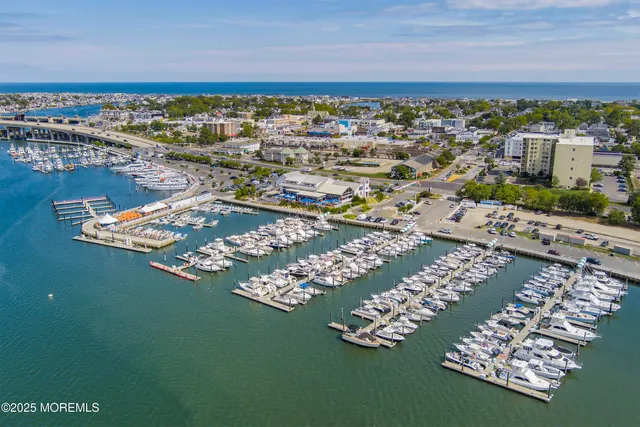 a group of people sitting in a yard