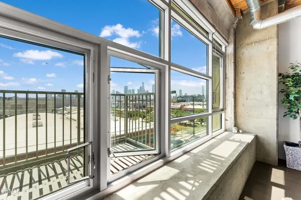 a view of a large room with a large window