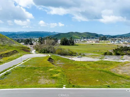 a view of a backyard with a patio