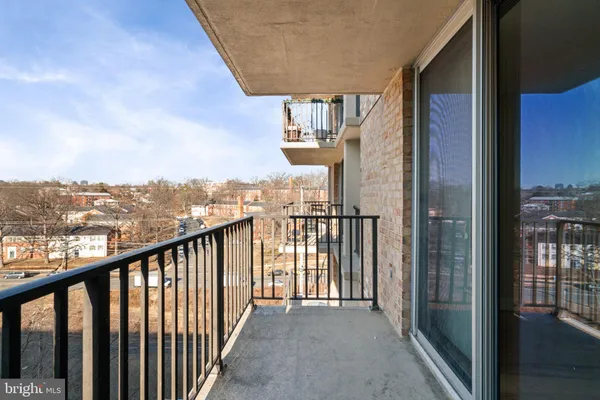a view of balcony with a glass door
