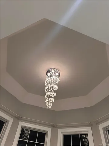 a view of roof deck with furniture