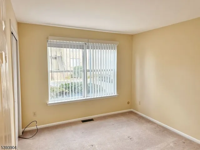 a view of a room with a window