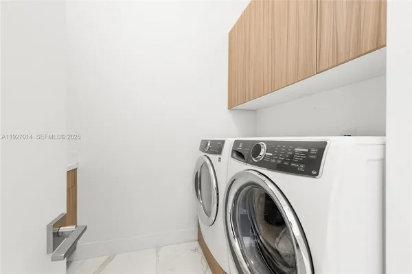 a view of a storage area with furniture