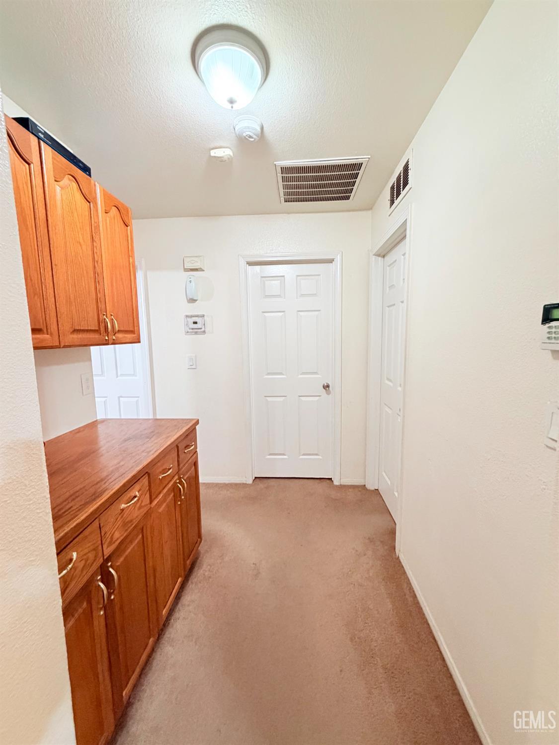 Undisclosed Address Bakersfield, CA 93313 - Photo 14 of 18 a view of a kitchen with an oven
