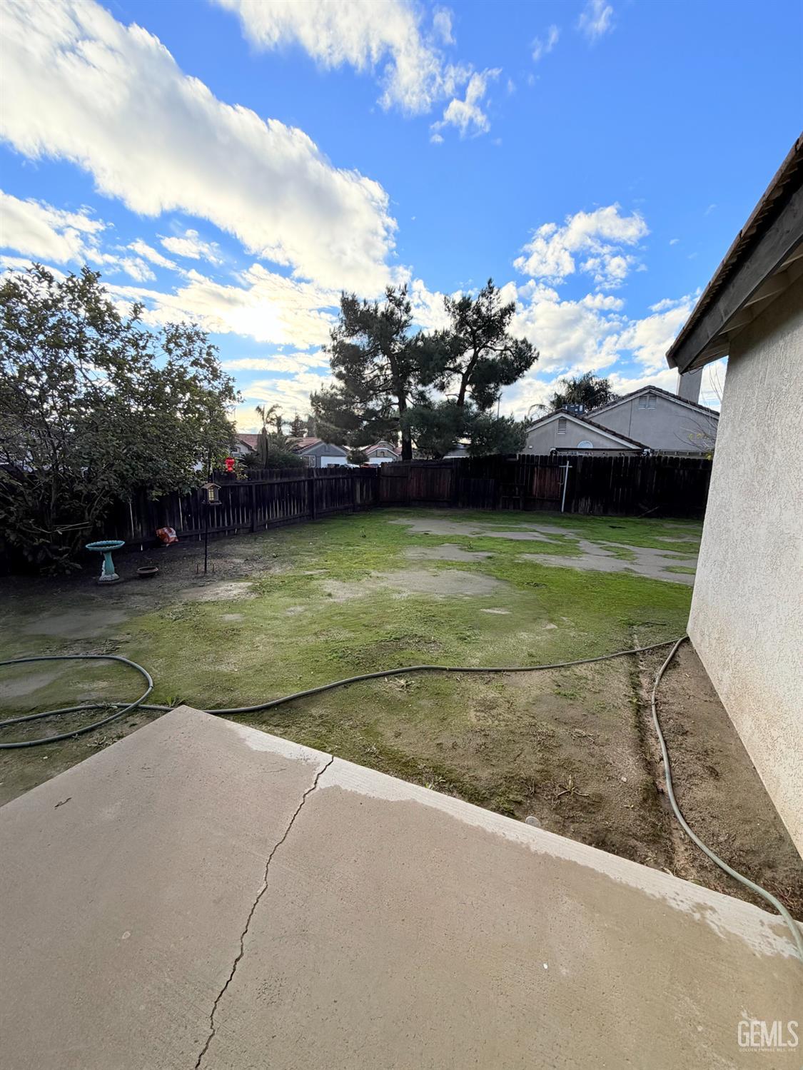 Undisclosed Address Bakersfield, CA 93313 - Photo 16 of 18 a view of a lake with a yard
