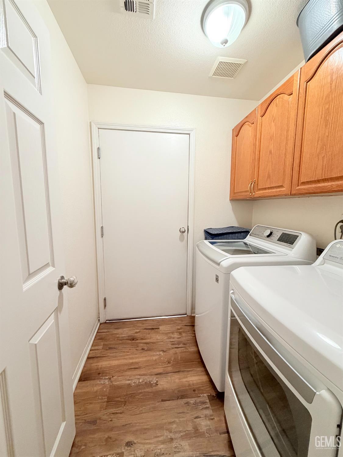 Undisclosed Address Bakersfield, CA 93313 - Photo 9 of 18 a room with storage and utility