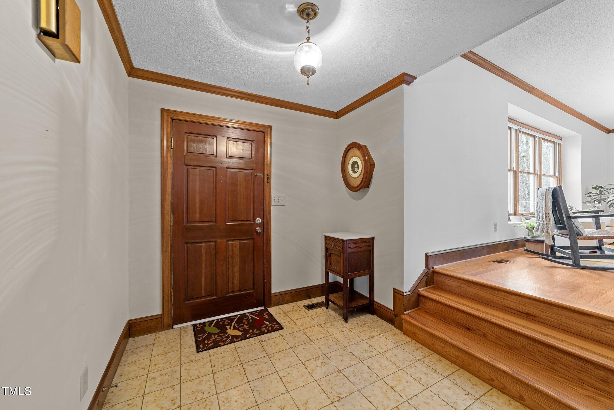 5012 Springwood Drive Raleigh, NC 27613 - Photo 5 of 44 Foyer