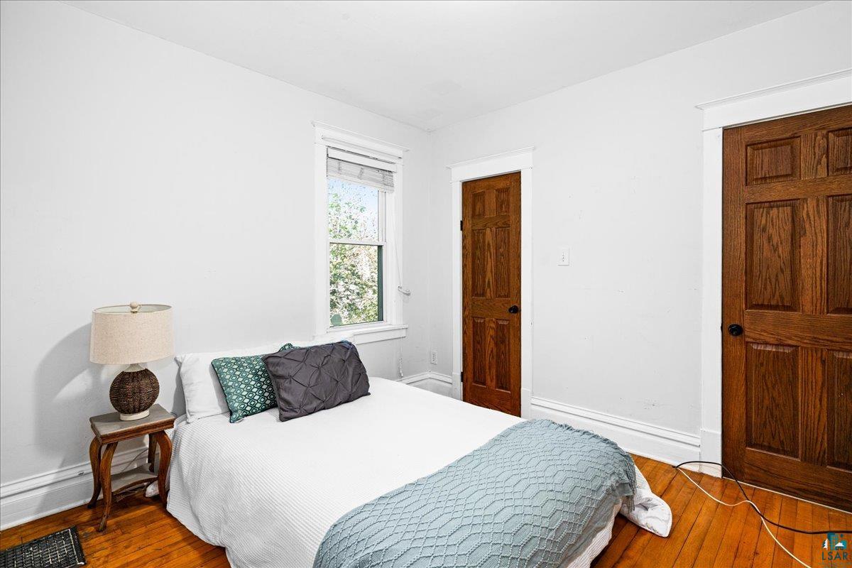 519 3rd Avenue Proctor, MN 55810 - Photo 13 of 25 Bedroom with hardwood / wood-style floors