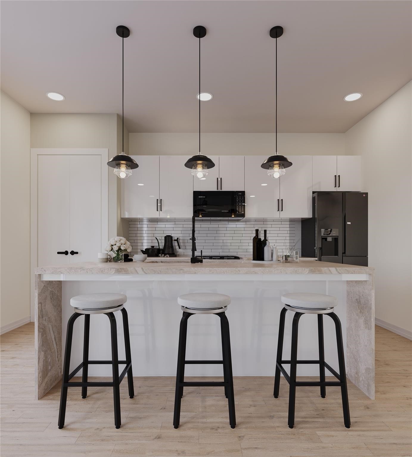 6545 Sealey Street Houston, TX 77091 - Photo 4 of 8 a kitchen with stainless steel appliances kitchen island a table and chairs
