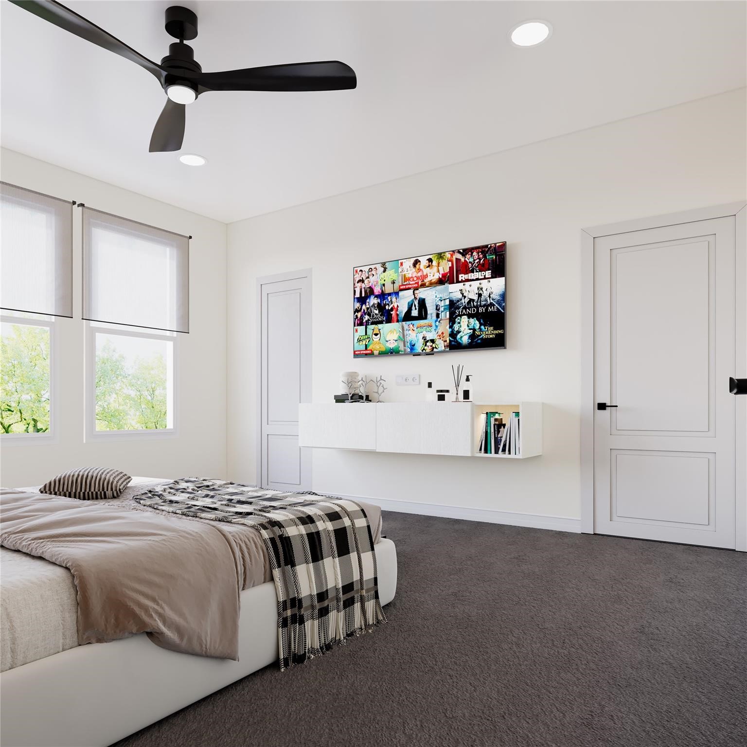 6545 Sealey Street Houston, TX 77091 - Photo 6 of 8 a bedroom with a bed and a flat screen tv