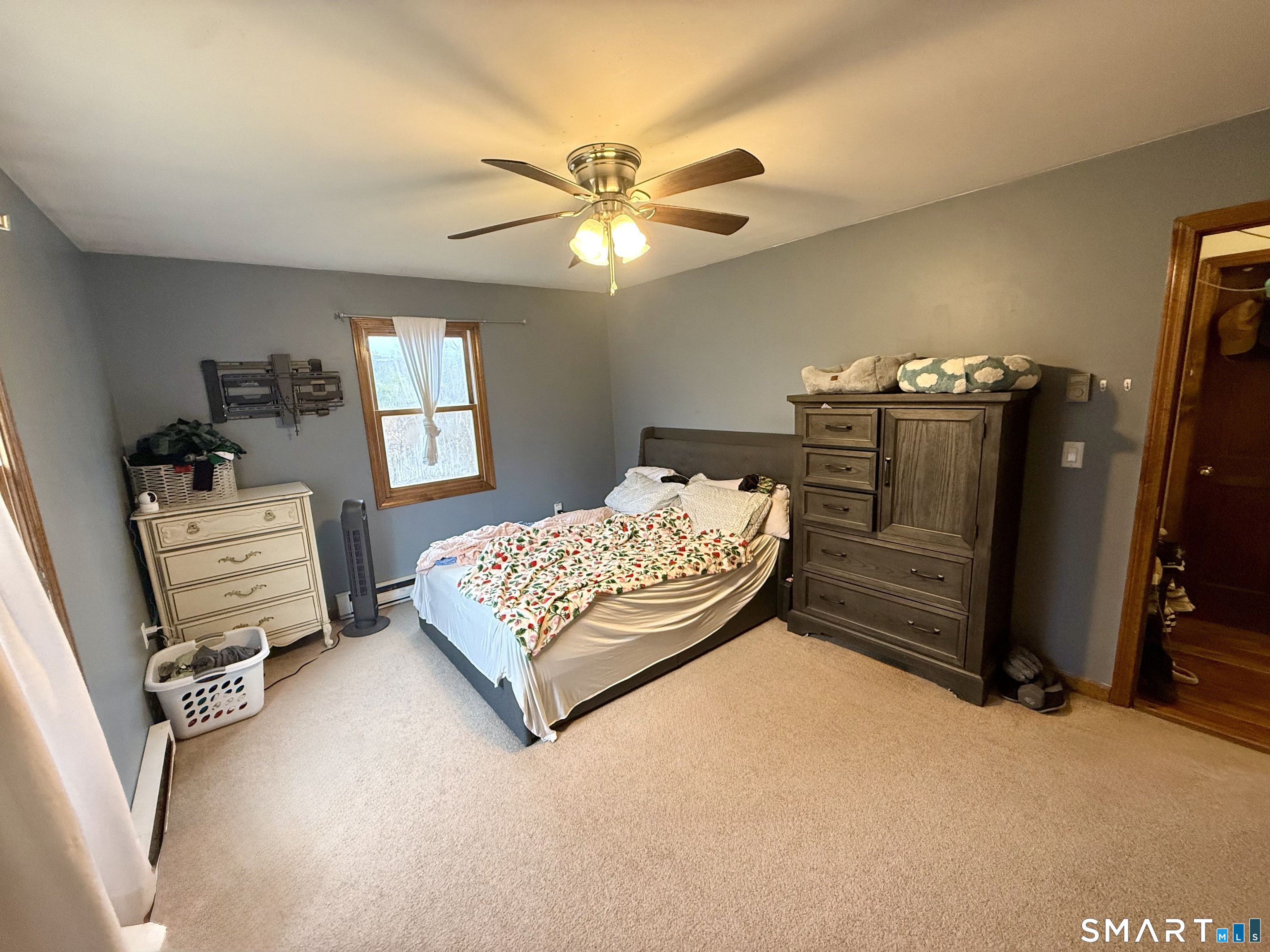 1257 Durham Road Wallingford, CT 06492 - Photo 11 of 19 a bedroom with a bed dresser and a window