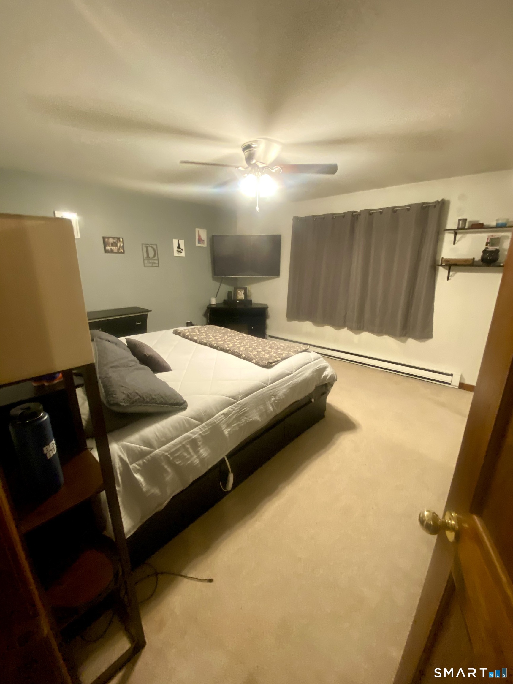 1257 Durham Road Wallingford, CT 06492 - Photo 12 of 19 a bedroom with a bed and a night stand