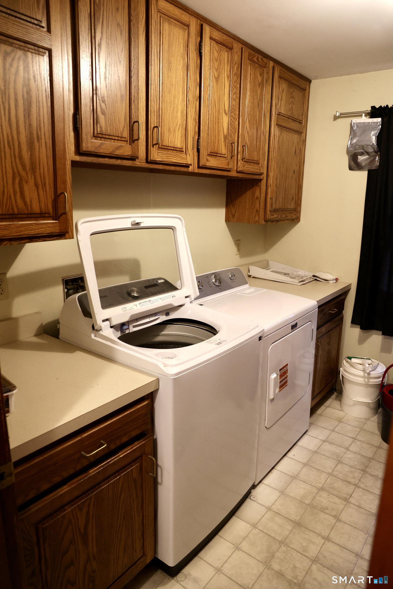 1257 Durham Road Wallingford, CT 06492 - Photo 7 of 19 a utility room with dryer and washer