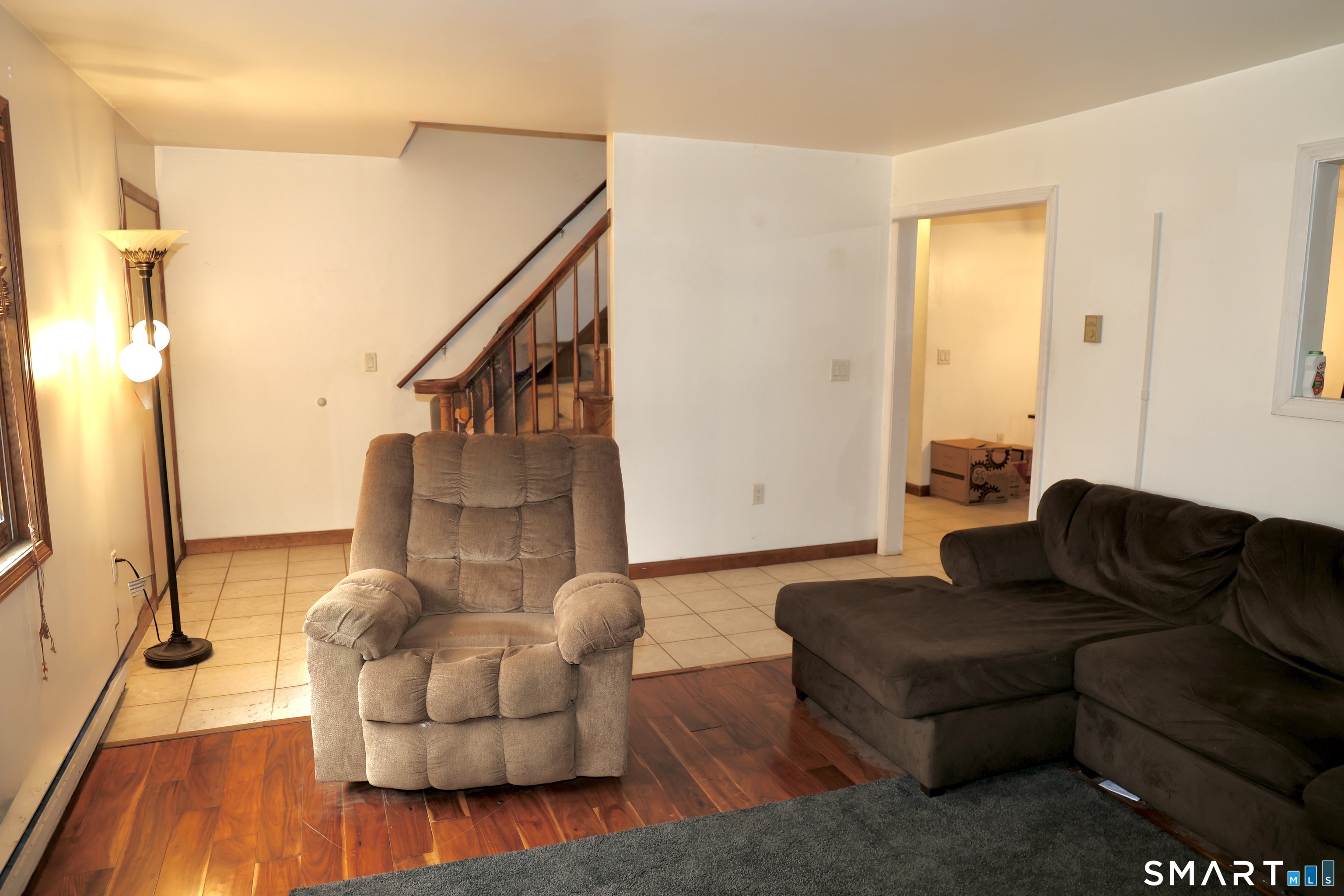 1257 Durham Road Wallingford, CT 06492 - Photo 10 of 19 a living room with furniture and a flat screen tv