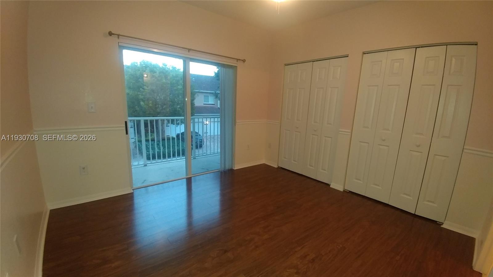 2452 Southeast 19th Court Homestead, FL 33035 - Photo 8 of 10 a view of entryway with wooden floor