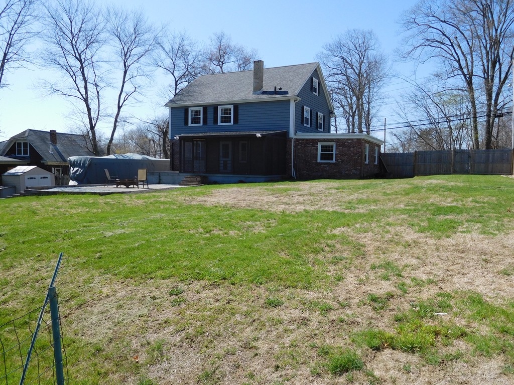 39 Parham Road Tyngsborough, MA 01879 - Photo 8 of 30 a house view with a garden space