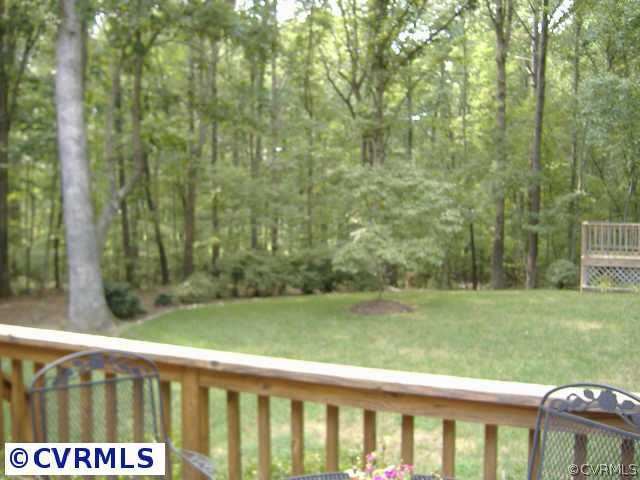 538 Fords Road Manakin-Sabot, VA 23103 - Photo 8 of 10 a view of a wooden fence and trees in the background